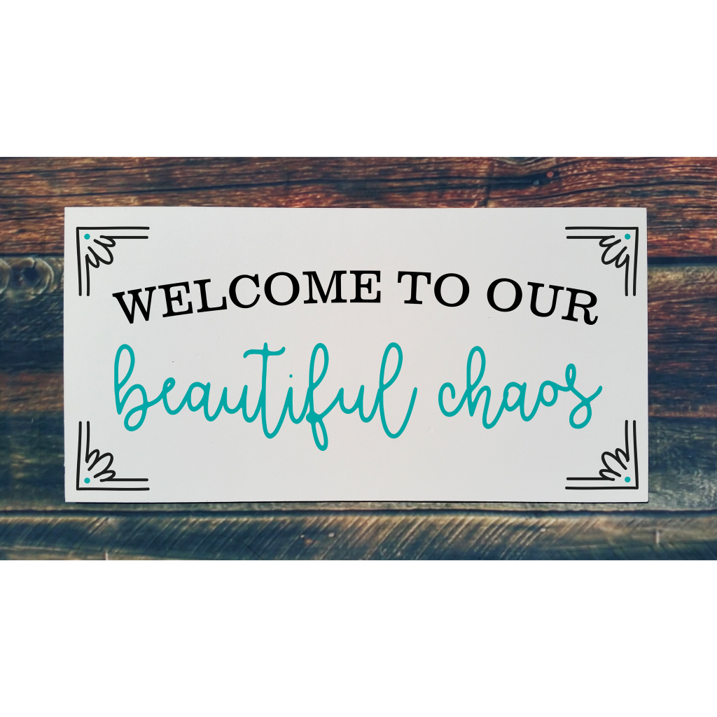 "Welcome to our beautiful chaos" on 24x12 board