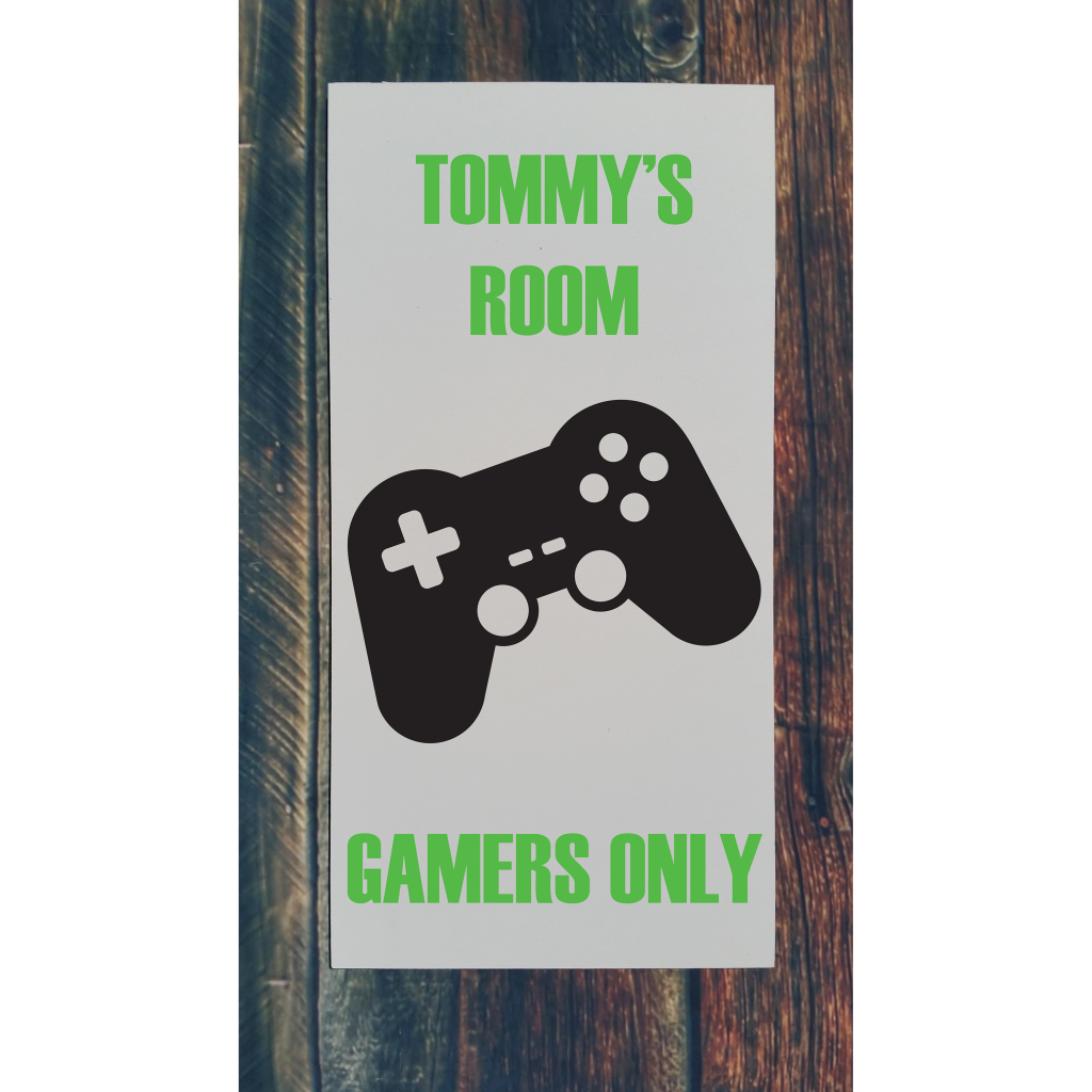 "Tommy's Room Gamers Only“ with gaming remote on 12x24 board